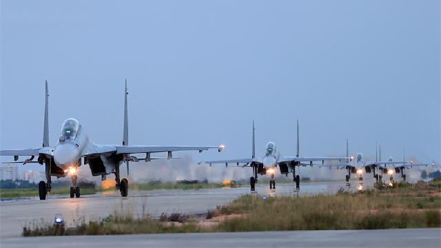 Fighter jets taxi on the runway 