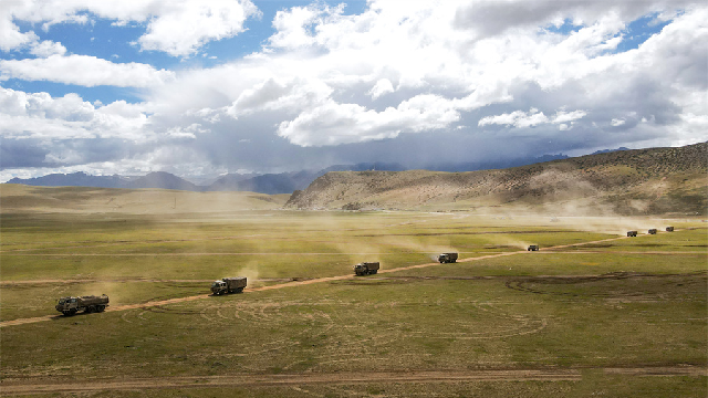 Vehicles conduct maneuver training