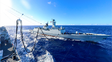 Comprehensive supply ship Luomahu conducts replenishment-at-sea