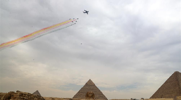 Chinese air force planes fly over Giza Pyramids in Egypt